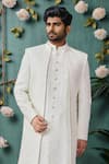 Arihant Rai Sinha_Cream Silk, Faux Leather, Polyester Sequins, Embroidery Thread And Sherwani Set _Online_at_Aza_Fashions
