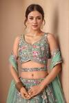 Samyukta Singhania_Green Net, Linen Sequins, Pearls, Mirrors, Embroidery, Floral Zari Lehenga Set_at_Aza_Fashions