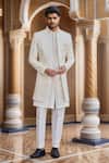 Buy_Arihant Rai Sinha_Cream Silk, Faux Leather Cut Work, Sequins, Beads Dori Embroidered Sherwani Set _at_Aza_Fashions