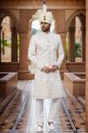 Buy_Arihant Rai Sinha_Cream Chanderi, Silk Embroidery, Stones Bahar Sherwani And Churidar_at_Aza_Fashions