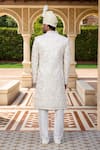 Shop_Arihant Rai Sinha_Cream Chanderi, Silk Embroidery, Stones Bahar Sherwani And Churidar_at_Aza_Fashions