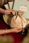 Buy_AMYRA_Beige Crochet Zari Crystal Tassel Potli Bag 