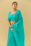 Samyukta Singhania Blue Georgette Pearls, Embroidery Asymmetric Turquoise Lehenga Set at Aza Fashions Samyukta Singhania_Blue Georgette Pearls, Embroidery Asymmetric Turquoise Lehenga Set_at_Aza_Fashions