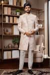 Buy_Arihant Rai Sinha_Beige Jacquard, Silk Embroidery Floral Paisley Sherwani And Aligadhi Pant _Online_at_Aza_Fashions