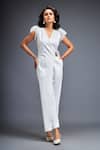 Deepika Arora_White Ponte Rama Plain V Neck Panelled Jumpsuit _at_Aza_Fashions