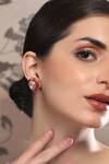 Shop_Auraa Trends_Red Rhinestones Gold Finish Kundan Ruby Stud Earrings _Online_at_Aza_Fashions