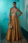 Buy Saahiil Kapoor Gold Silk, Chanderi, Organza Sequins, Hasrat Dabka Embroidered Lehenga Cape Set at Aza Fashions Buy_Saahiil Kapoor_Gold Silk, Chanderi, Organza Sequins, Hasrat Dabka Embroidered Lehenga Cape Set _at_Aza_Fashions