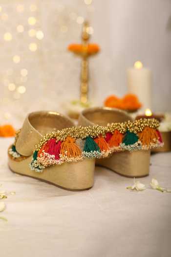 Shop_5elements_Gold Tassels, Beads Peacock Motif Wedges _at_Aza_Fashions