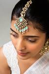 Zevar King_Green Stone Embellished Drop Pattern Maangtikka _Online_at_Aza_Fashions