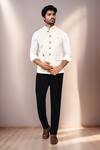 Buy_Arihant Rai Sinha_Cream Cotton Satin Sleeveless Bundi With Pocket Detail _at_Aza_Fashions