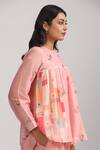 Trendy tokari_Pink Silk Chanderi Printed Vertical Lace Embellished Peplum Top And Pant Set _at_Aza_Fashions