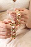Joules By Radhika_Gold Plated Stones, Cut Work Red Bangles Set_Online_at_Aza_Fashions
