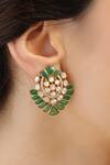 Shop Joules By Radhika Green Stones Lotus Shaped Stud Earrings at Aza Fashions Shop_Joules By Radhika_Green Stones Lotus Shaped Stud Earrings_at_Aza_Fashions