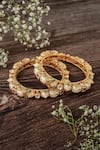 Buy_Vivinia By Vidhi Mehra_Gold Plated Stones Floral Carved Temple Bangles Set _at_Aza_Fashions