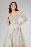 Samyukta Singhania_Beige Net, Organza Sequins, Embroidery, Stones V-neck Ombre Lehenga Set _at_Aza_Fashions