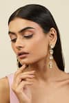 Buy_Isharya_Gold Plated Crystals Embellished Dangler Earrings _at_Aza_Fashions