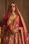 Shop Rimple And Harpreet Narula Pink Tulle Pearls, Zari, Beads, Sequins V-neck Paisley Embroidered Lehenga Set at Aza Fashions Shop_Rimple And Harpreet Narula_Pink Tulle Pearls, Zari, Beads, Sequins V-neck Paisley Embroidered Lehenga Set _at_Aza_Fashions