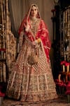 Buy_Rimple And Harpreet Narula_Red Tulle Pearls, Sequins Sweetheart Neck Floral Embroidered Bridal Lehenga Set _at_Aza_Fashions