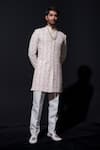Buy_Niloufer By Aasif Ally_White Silk Cut Work, Pearls Floral Cutdana Embroidered Sherwani Set _at_Aza_Fashions