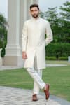 Buy_Niloufer By Aasif Ally_Ivory Silk Cut Work Cutdana Sherwani And Trouser Set _at_Aza_Fashions