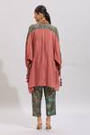 Shop_Samyukta Singhania_Orange Silk, Cotton Tassels, Embroidery Solid Button Highlighted Kurta Set _at_Aza_Fashions