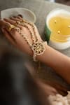 Do Taara_Gold Plated Crystals, Beads Kundan Hathphool Bracelet _Online_at_Aza_Fashions