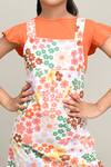 Samyukta Singhania_Orange Cotton Floral Print Pinafore Dress _at_Aza_Fashions