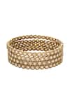 Shop_Samyukta Singhania_Gold And White Beaded Bangles Set _at_Aza_Fashions