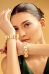 Buy_Samyukta Singhania_Gold And White Stone Studded Bangles _at_Aza_Fashions