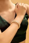 Buy_Nazaakat By Samara Singh_Gold Plated Imitation Diamonds And White Stone Embellished Bangles _Online_at_Aza_Fashions
