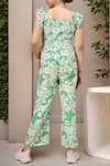 Shop_Petite Pomme_Green Rayon Tassels Floral Smocked Frilled Sleeveless Jumpsuit _at_Aza_Fashions