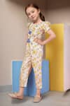 Samyukta Singhania_Yellow Cotton Tassels Floral Jumpsuit With Bow Detail _Online_at_Aza_Fashions