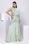 Buy Smriti By Anju Agarwal Green Silk Pearls, Embroidery Round Neck Embellished Pre-draped Saree at Aza Fashions Buy_Smriti By Anju Agarwal_Green Silk Pearls, Embroidery Round Neck Embellished Pre-draped Saree _at_Aza_Fashions