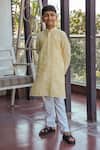 Buy_Taber Tikri_Floral Print Yellow Kurta Set For Boys _at_Aza_Fashions