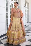 Buy_Kalista_Peach Satin, Silk Embroidery V-neck Nehmat And Yellow Lehenga Set _at_Aza_Fashions