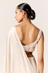 Shop_Manika Nanda_Ivory Metallic Lycra Slit Saree _at_Aza_Fashions