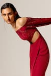 Manika Nanda_Deep Red Star Cutout Gown _at_Aza_Fashions