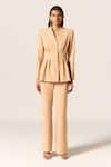 Manika Nanda_Beige Peplum Blazer And Pant Set _at_Aza_Fashions