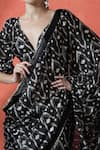 Samyukta Singhania_Black V-neck Printed Pre-draped Saree Set _at_Aza_Fashions
