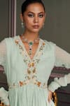 Buy_Mustard Moon by Neyha and Vrinda_Green Georgette, Net Embroidery, Tassels V-neck Amara Sage Kurta Set _Online_at_Aza_Fashions