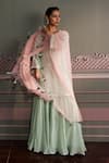 Mustard Moon by Neyha and Vrinda_Green Georgette, Net Embroidery, Sequins, Tassels V-neck Saanvi Sage Kurta Set _Online_at_Aza_Fashions