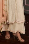 Mustard Moon by Neyha and Vrinda_Peach Georgette Sequins, Tassels Keyhole Neck Pariza Biscuit Kurta Set _Online_at_Aza_Fashions