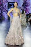 Megha Bansal_Rose Gold Tulle, Viscose Sequins, Embroidery V-neck Lehenga Set _at_Aza_Fashions