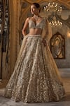 Buy_Seema Gujral_Gold Net Sequins, Beads V-neck Lehenga Set _at_Aza_Fashions