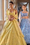 Seema Gujral_Yellow Net Sequins, Cut Work Round Neck Lehenga Set _at_Aza_Fashions