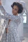 Seema Gujral_Silver Net Sequins, Cut Work, Embroidery V-neck Jacket Lehenga Set _at_Aza_Fashions