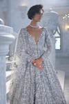 Shop_Seema Gujral_Silver Net Sequins, Cut Work, Embroidery V-neck Jacket Lehenga Set 