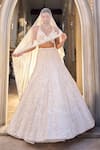 Buy_Seema Gujral_Ivory Net Sequins, Embroidery V-neck Floral Lehenga Set _at_Aza_Fashions
