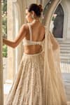 Shop_Seema Gujral_Beige Tissue, Silk, Organza Sequins, Beads, Embroidery Chandelier Lehenga Set _at_Aza_Fashions