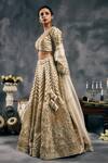 Buy_Vandana Sethi_Ivory Organza Beads, Embroidery V-neck Lehengas Set _Online_at_Aza_Fashions